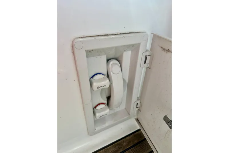  Yacht Photos Pics Water control panel on a 2004 Beneteau 50 yacht, featuring Whale brand valves.