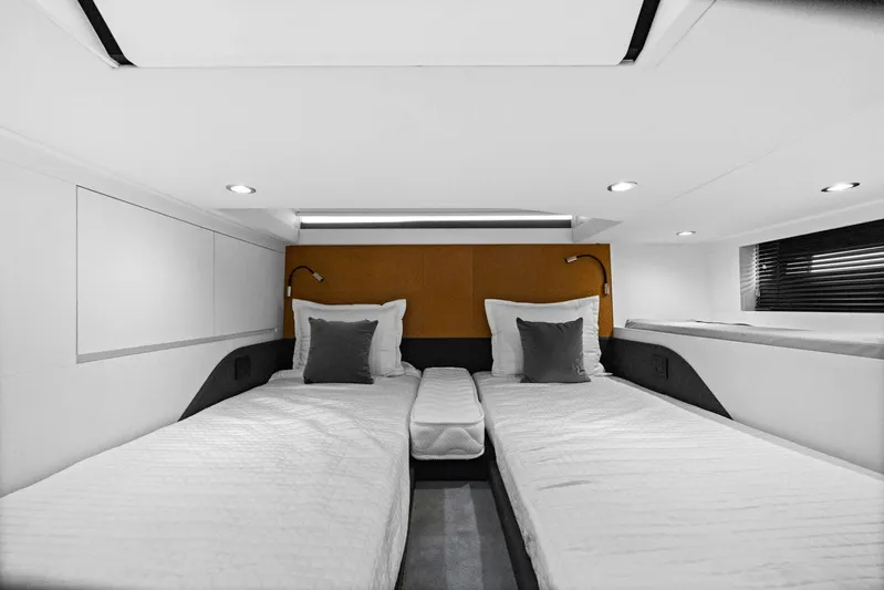 Second Chances Yacht Photos Pics 2022 Azimut Verve 47 cabin interior with twin beds and modern lighting.