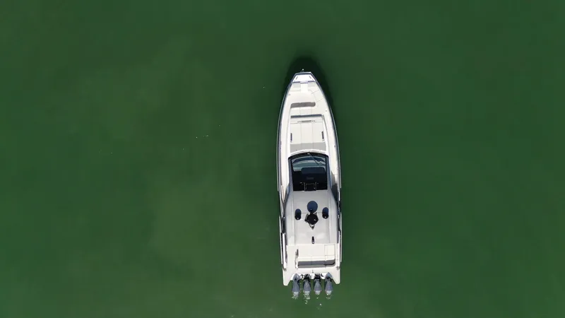 Second Chances Yacht Photos Pics Aerial view of 2022 Azimut Verve 47 yacht on green water.