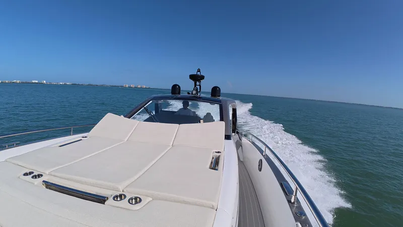 Second Chances Yacht Photos Pics Azimut Verve 47 yacht cruising on open water, 2022 model, clear blue sky.