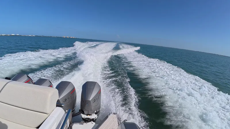 Second Chances Yacht Photos Pics 2022 Azimut Verve 47 cruising on open water, leaving a wake behind.