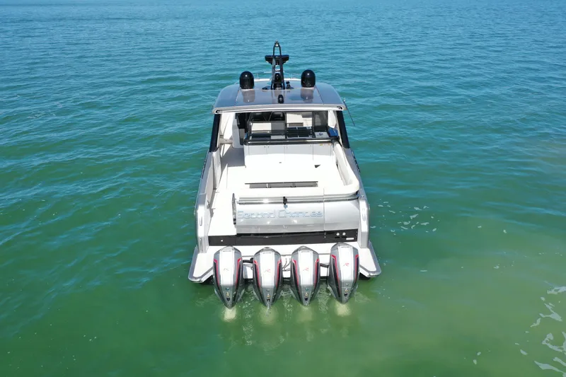 Second Chances Yacht Photos Pics Azimut Verve 47 yacht, 2022 model, with four powerful outboard engines on open water.