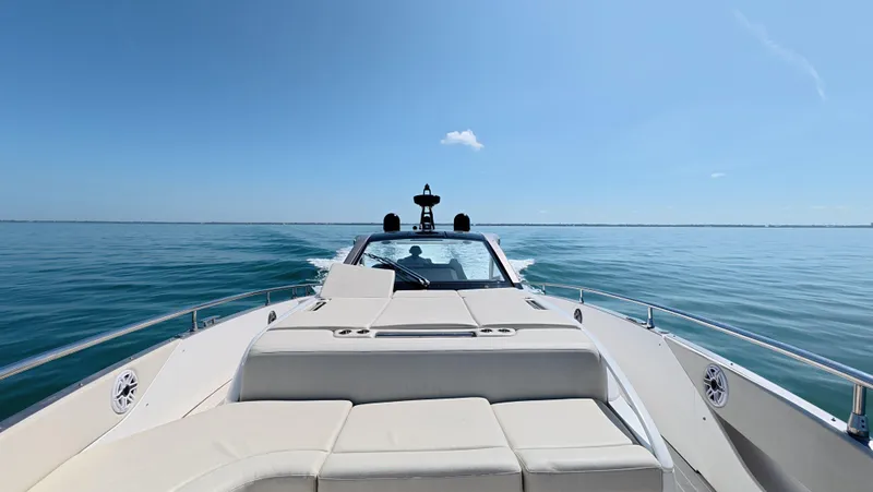 Second Chances Yacht Photos Pics 2022 Azimut Verve 47 cruising on calm blue waters under a clear sky.