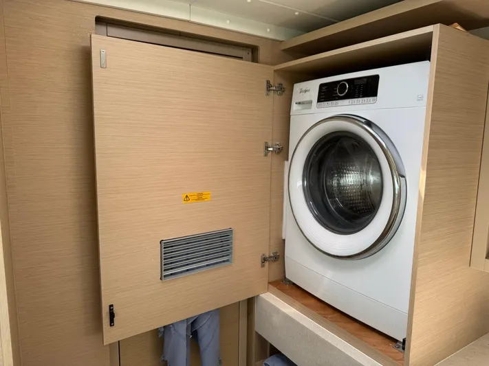 Primrose Yacht Photos Pics Washing machine in 2023 Lagoon 46 yacht's wooden cabinet.
