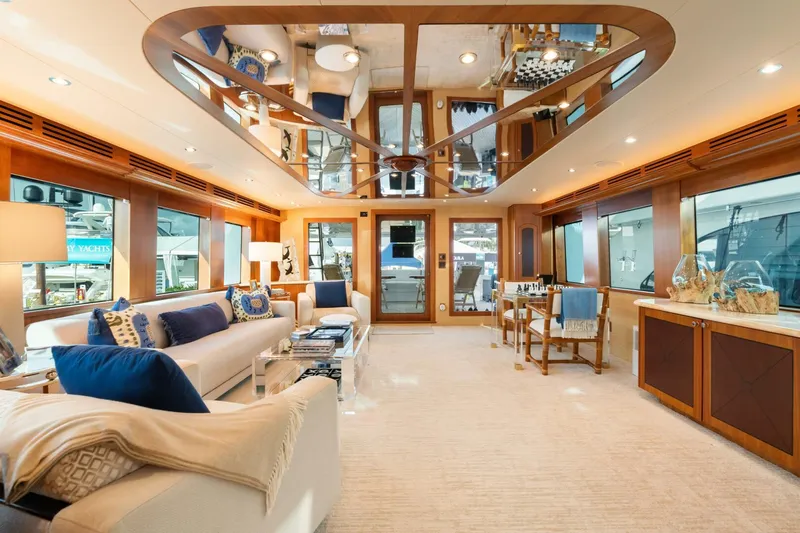 Magic Yacht Photos Pics Luxurious interior of 2005 Hatteras 100 Motor Yacht with elegant furnishings and decor.