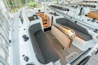 2023 Dehler 34 yacht interior with sleek seating and modern design.