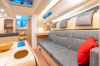 Modern interior of 2023 Dehler 34 yacht with sleek design and comfortable seating.