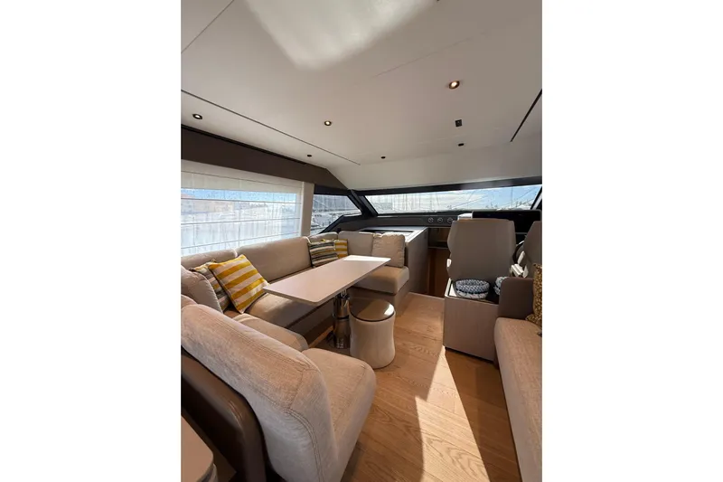  Yacht Photos Pics Luxurious interior of 2023 Ferretti Yachts 580 with elegant seating and modern design.