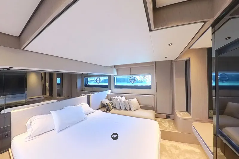  Yacht Photos Pics Luxurious bedroom interior of 2023 Ferretti Yachts 580, featuring elegant design and modern amenities.