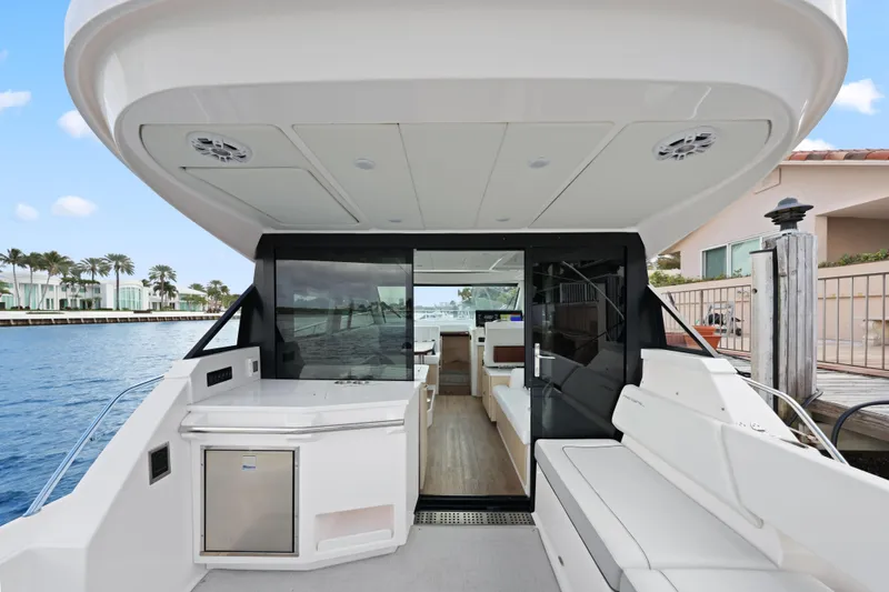 Yacht Photos Pics 2024 Regal 38 XO yacht interior with sleek design and waterfront view.