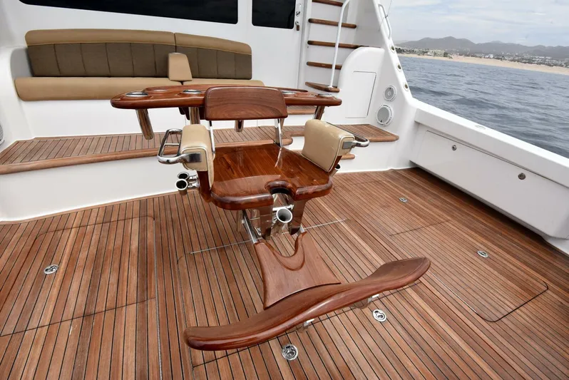 Crank It Up Yacht Photos Pics 2014 Viking 62 Convertible yacht with teak deck and fishing chair.