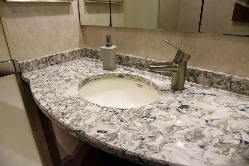 Crank It Up Yacht Photos Pics Marble bathroom sink in 2014 Viking 62 Convertible yacht.