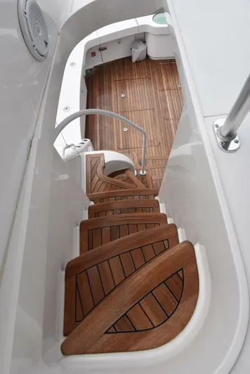 Crank It Up Yacht Photos Pics Staircase on 2014 Viking 62 Convertible yacht with teak wood steps.