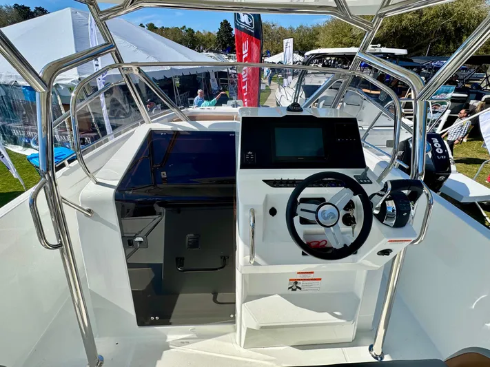  Yacht Photos Pics 2024 Beneteau Flyer 9 SPACEdeck helm with modern controls and sleek design.
