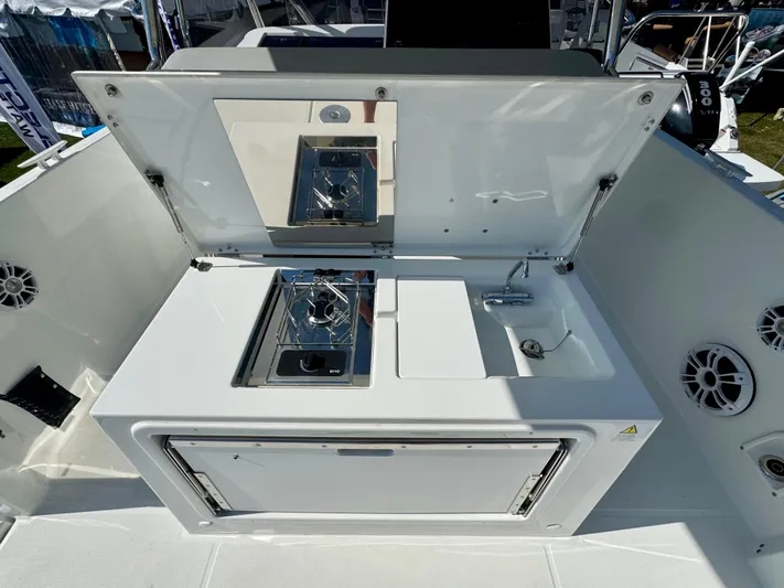  Yacht Photos Pics 2024 Beneteau Flyer 9 SPACEdeck outdoor kitchen with stove and sink.