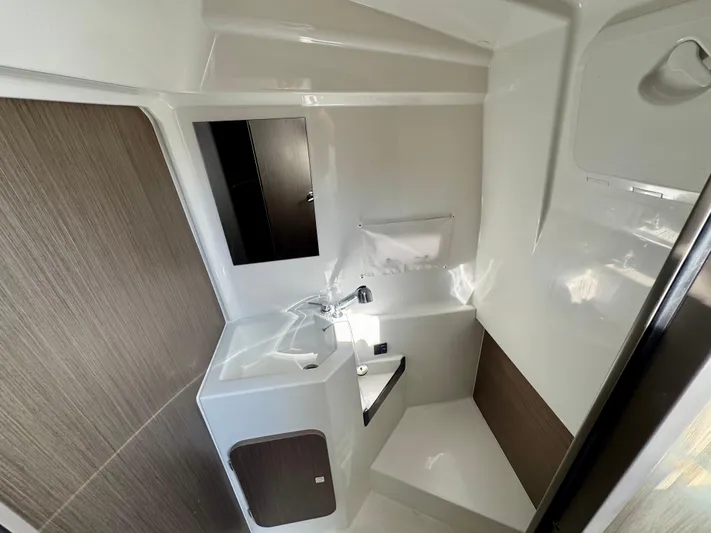  Yacht Photos Pics 2024 Beneteau Flyer 9 SPACEdeck interior cabin with modern design and compact amenities.