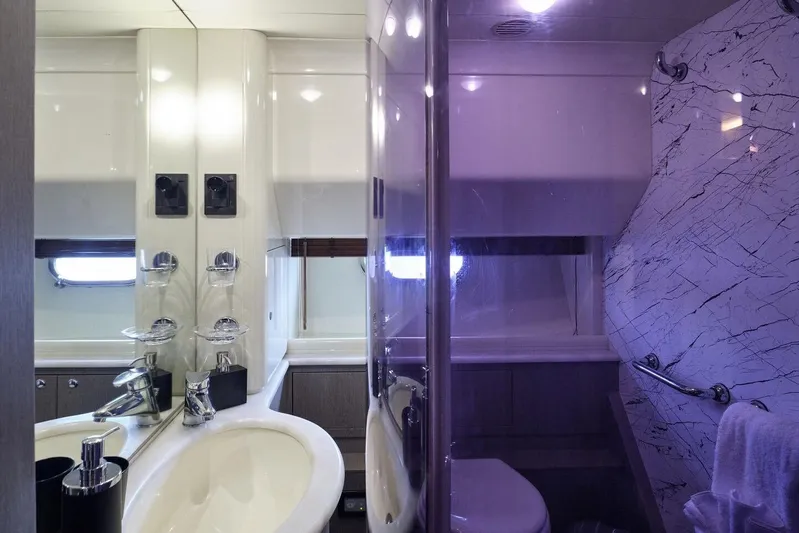 Miren Yacht Photos Pics Luxurious bathroom in a 2000 Ferretti Yachts 68, featuring modern fixtures and elegant design.