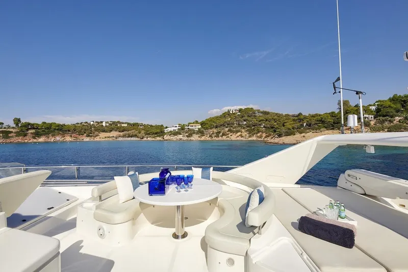 Miren Yacht Photos Pics Luxurious 2000 Ferretti Yachts 68 with scenic ocean view and elegant seating area.