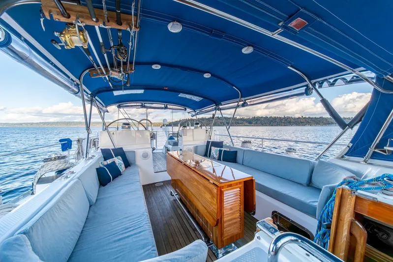 Voodoo Yacht Photos Pics Luxurious 2010 Hylas 70 yacht interior with blue canopy and comfortable seating.