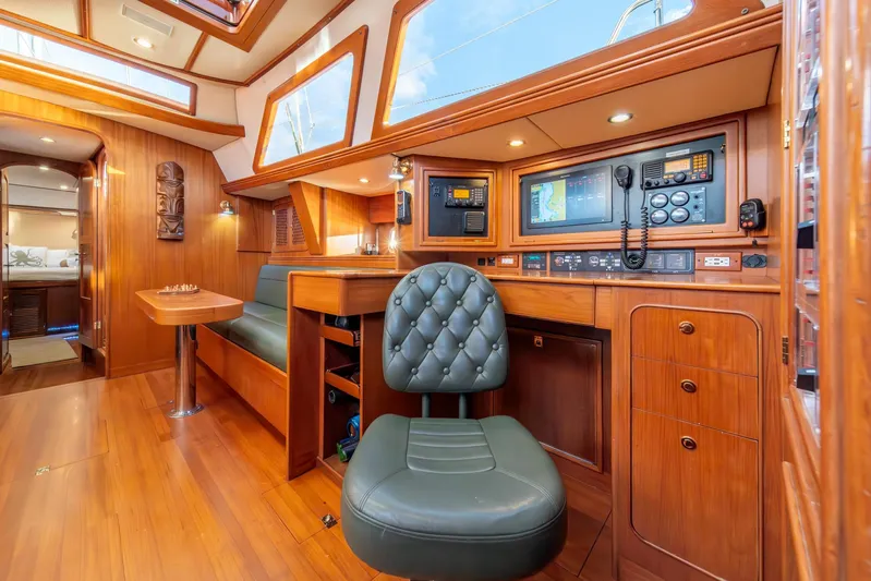 Voodoo Yacht Photos Pics Luxurious interior of 2010 Hylas 70 yacht with navigation station and seating area.