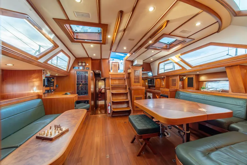 Voodoo Yacht Photos Pics Luxurious interior of a 2010 Hylas 70 yacht with wood finishes and skylights.