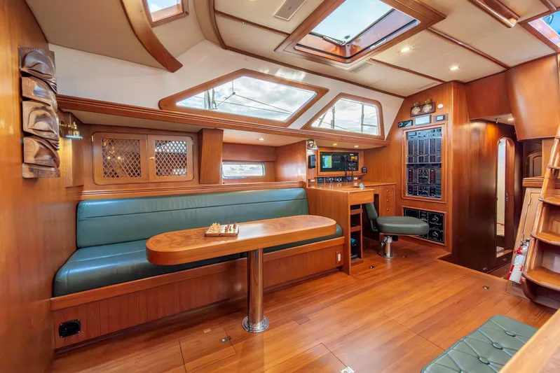 Voodoo Yacht Photos Pics Luxurious interior of 2010 Hylas 70 yacht with wood finish and skylights.