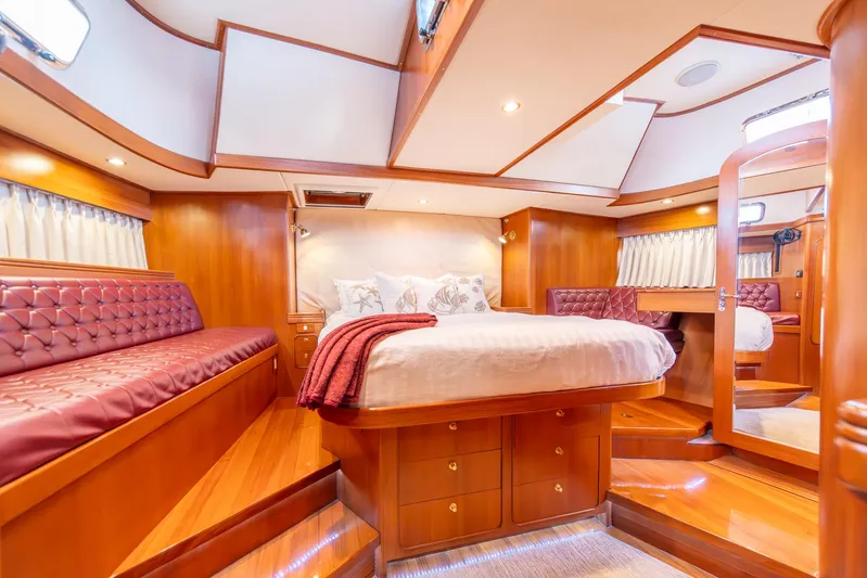 Voodoo Yacht Photos Pics Luxurious cabin interior of a 2010 Hylas 70 yacht with elegant wood finishes.