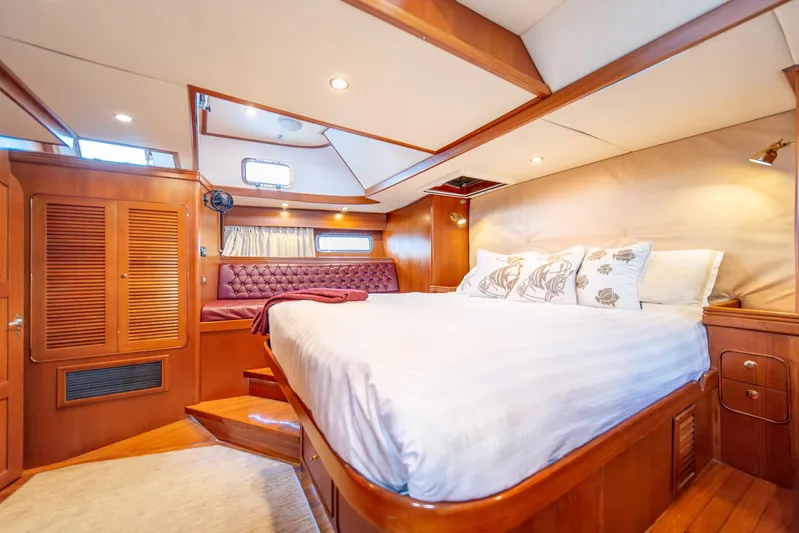 Voodoo Yacht Photos Pics Luxurious cabin interior of a 2010 Hylas 70 yacht with elegant wood finish.