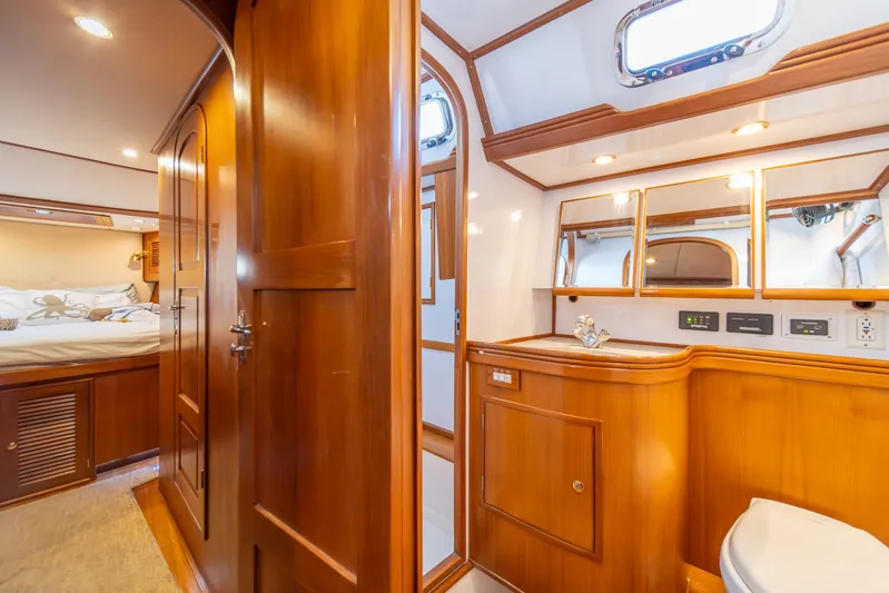 Voodoo Yacht Photos Pics Luxurious Hylas 70 yacht interior, featuring elegant wood finishes and modern amenities, 2010 model.