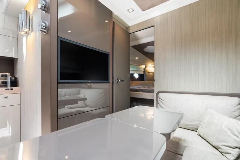 Damare Yacht Photos Pics Interior of 2022 Cranchi M 44 HT yacht with modern design and cozy seating area.