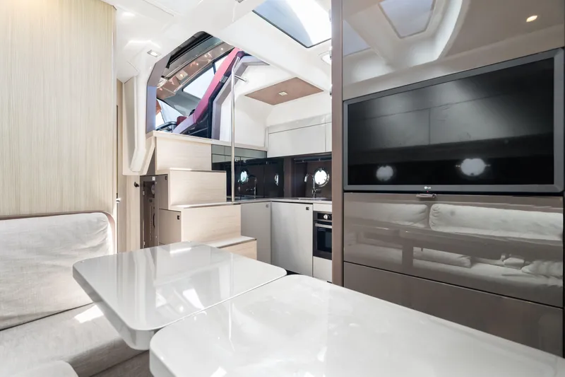 Damare Yacht Photos Pics Modern interior of 2022 Cranchi M 44 HT yacht with sleek design and luxurious amenities.