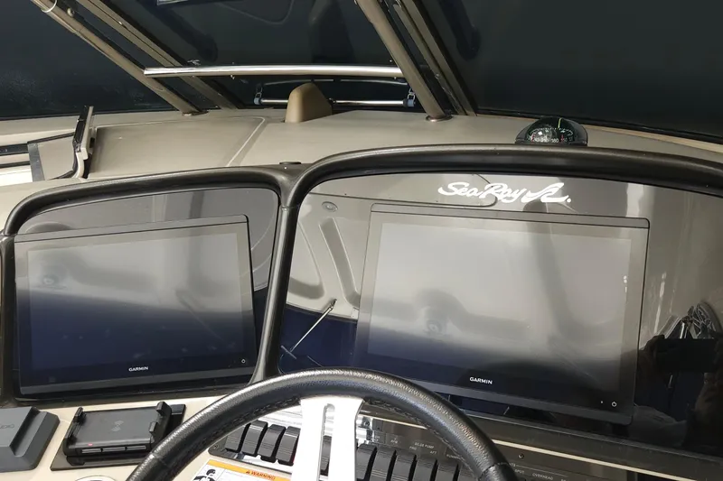  Yacht Photos Pics 2008 Sea Ray 40 Sundancer helm with dual Garmin displays and compass.