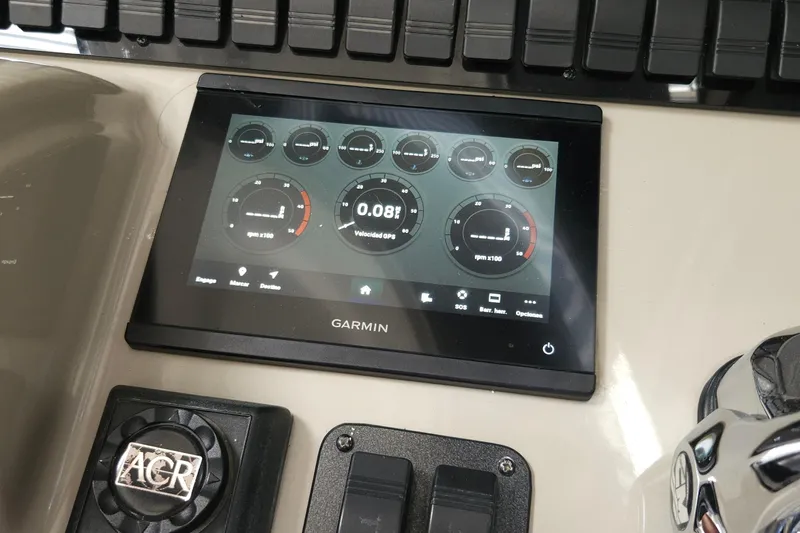  Yacht Photos Pics Garmin display on 2008 Sea Ray 40 Sundancer dashboard, showing navigation and engine data.