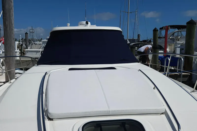  Yacht Photos Pics 2008 Sea Ray 40 Sundancer yacht docked at marina under clear blue sky.