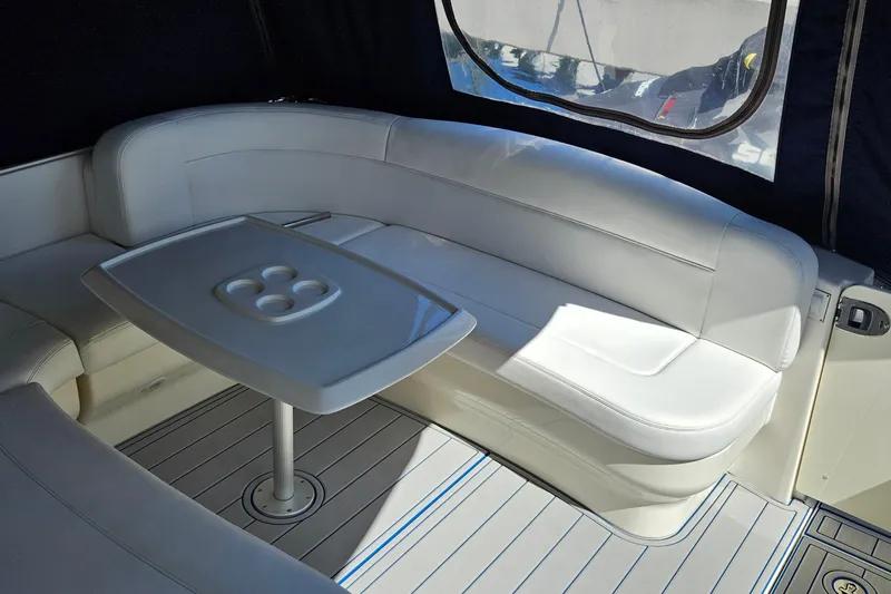  Yacht Photos Pics Luxurious seating area on 2008 Sea Ray 40 Sundancer yacht with sleek table design.