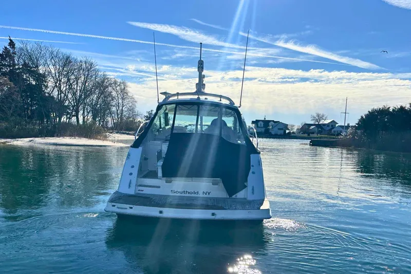  Yacht Photos Pics 2014 Sea Ray 410 Sundancer yacht on calm water near Southold, NY.