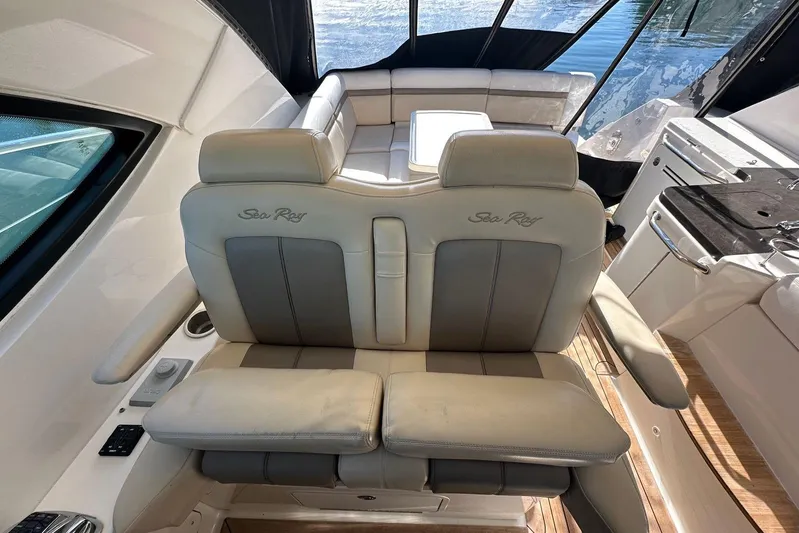  Yacht Photos Pics Luxurious interior of 2014 Sea Ray 410 Sundancer yacht with plush seating and elegant design.