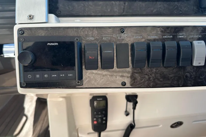  Yacht Photos Pics Control panel of 2014 Sea Ray 410 Sundancer with Fusion audio system and switches.