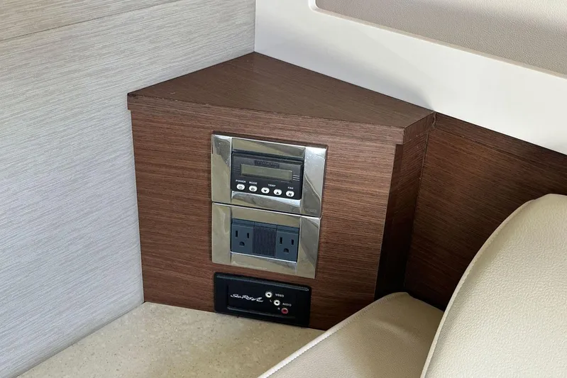  Yacht Photos Pics Control panel and outlets in 2014 Sea Ray 410 Sundancer yacht interior.