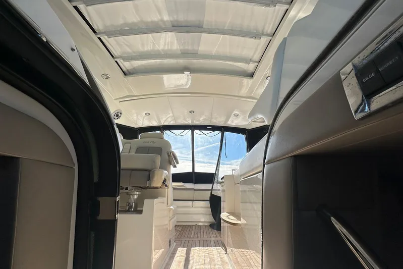  Yacht Photos Pics Interior view of 2014 Sea Ray 410 Sundancer yacht, featuring sleek design and modern seating.