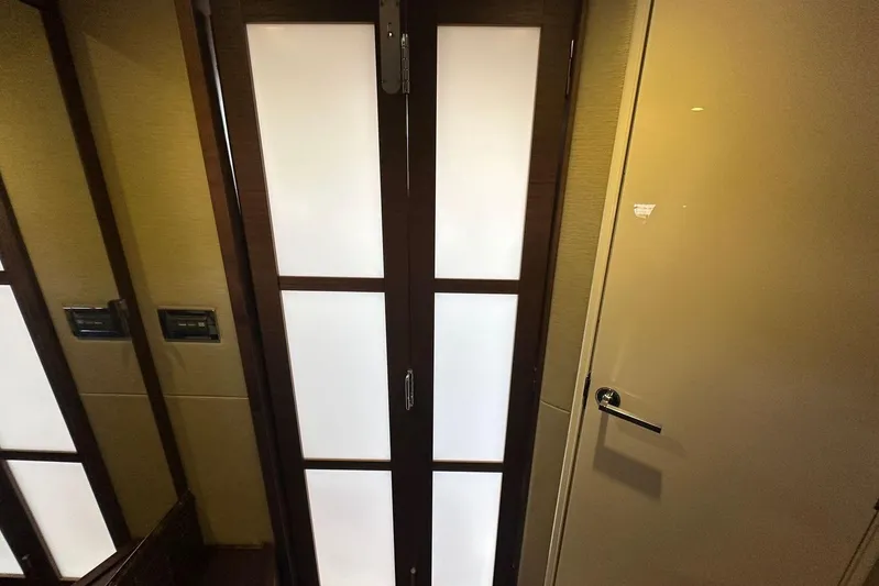  Yacht Photos Pics Interior door of a 2014 Sea Ray 410 Sundancer yacht, featuring modern design.