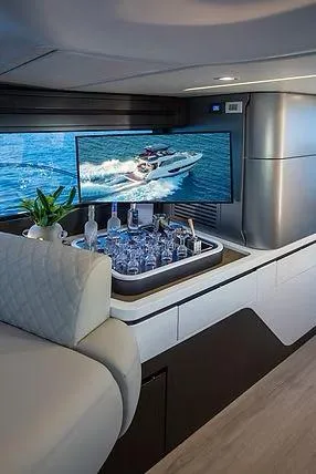  Yacht Photos Pics Luxurious Schaefer 600 yacht interior with bar and TV, 2026 model.