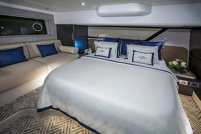  Yacht Photos Pics Luxurious Schaefer 600 yacht bedroom interior with elegant bedding and modern design, 2026 model.
