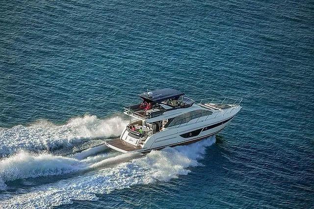  Yacht Photos Pics 2026 Schaefer 600 yacht cruising on open blue water.