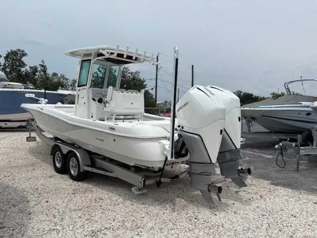 Caymas 28 Hb Twin Yacht Photos Pics 2022 Caymas 28 Twin boat on trailer with dual outboard engines.