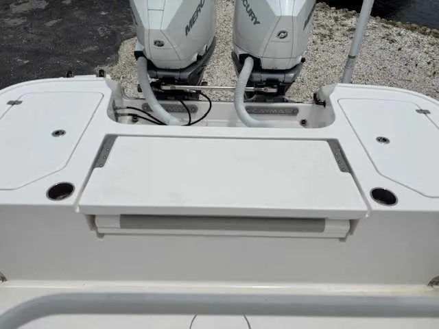 Caymas 28 Hb Twin Yacht Photos Pics 2022 Caymas 28 Twin boat with dual Mercury engines, rear deck view.