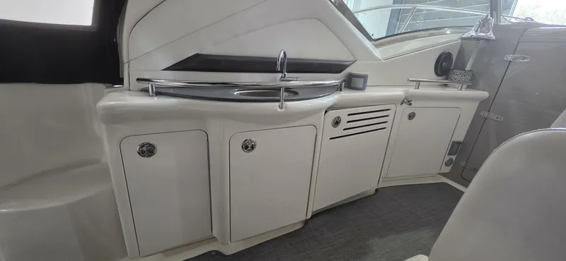  Yacht Photos Pics 2005 Sea Ray 40 Sundancer interior with sleek kitchenette and modern design.