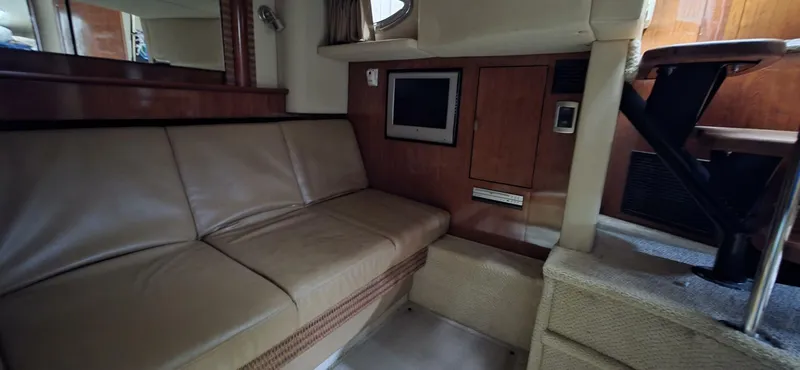  Yacht Photos Pics Interior of 2005 Sea Ray 40 Sundancer with leather seating and built-in TV.