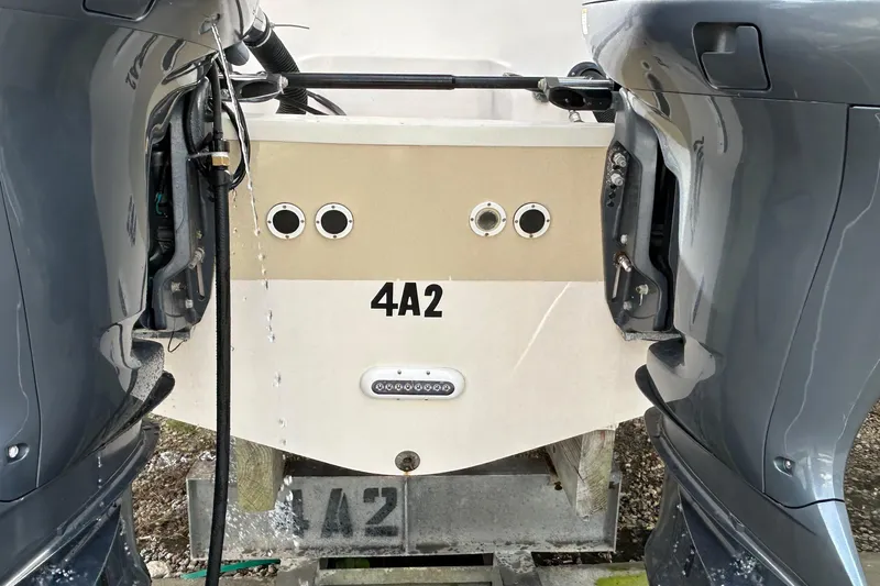  Yacht Photos Pics 2013 Grady-White Freedom 335 boat stern with twin outboard motors.