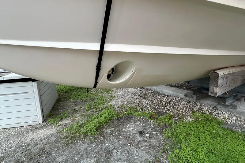  Yacht Photos Pics 2013 Grady-White Freedom 335 boat hull on dry dock, showing side view.